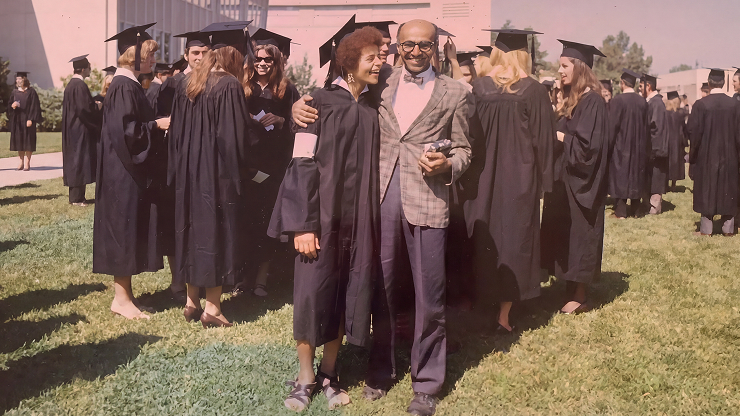 David Blackwell with a graduate at a university commencement ceremony