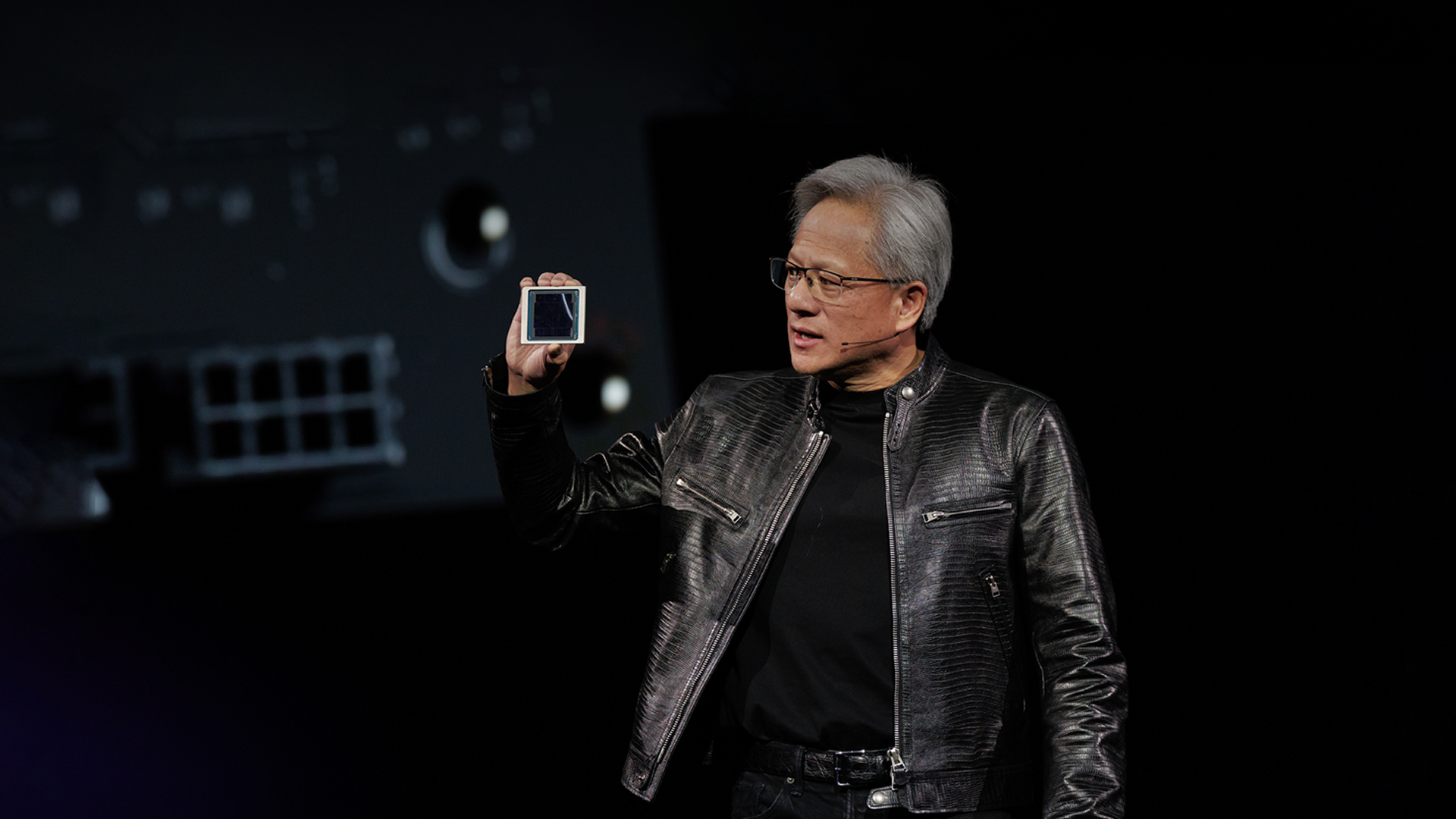 Jensen Huang announcing the Blackwell GPU architecture on stage